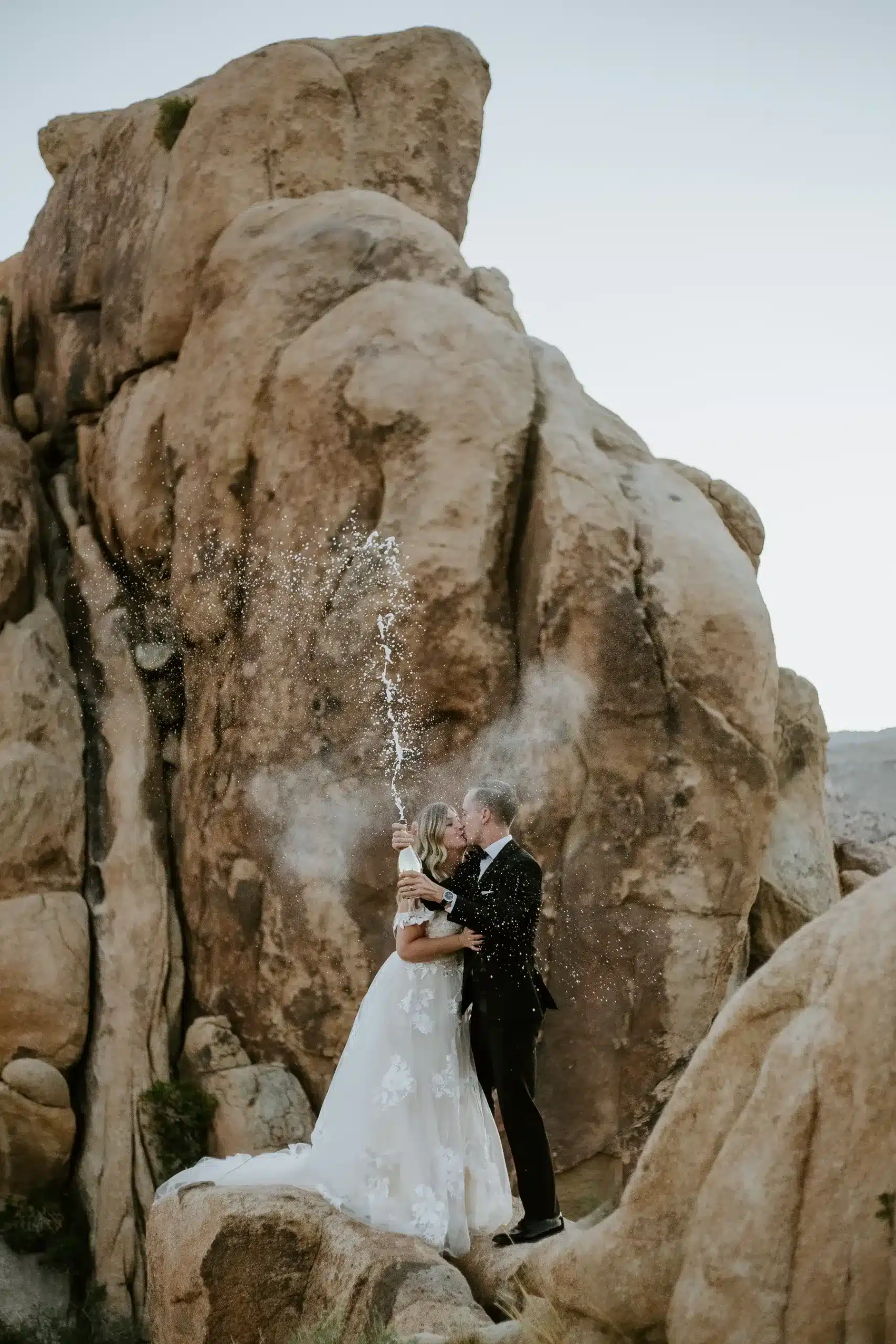 Groom and bride getting married in Joshua Tree