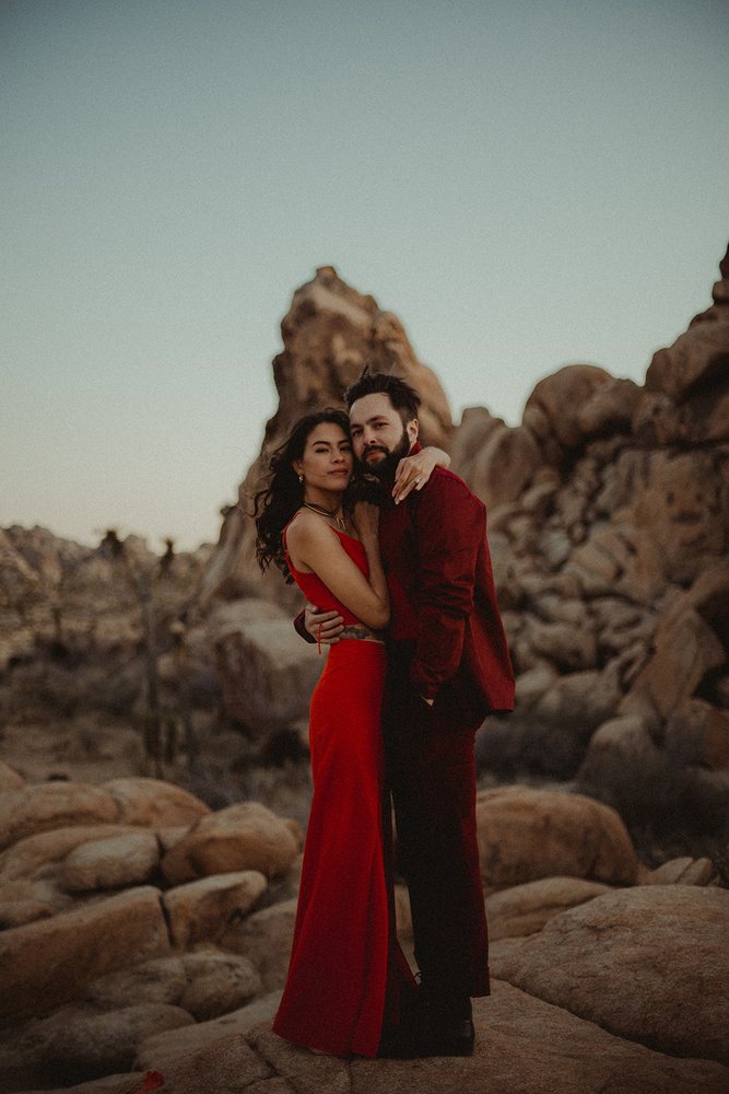 Couple in red among the boulders