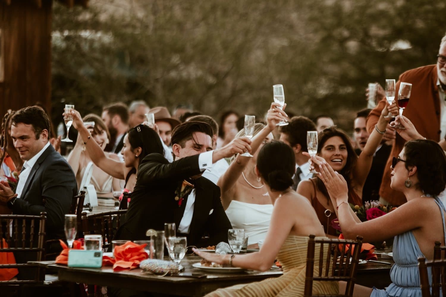 Guests raising a champagne toast