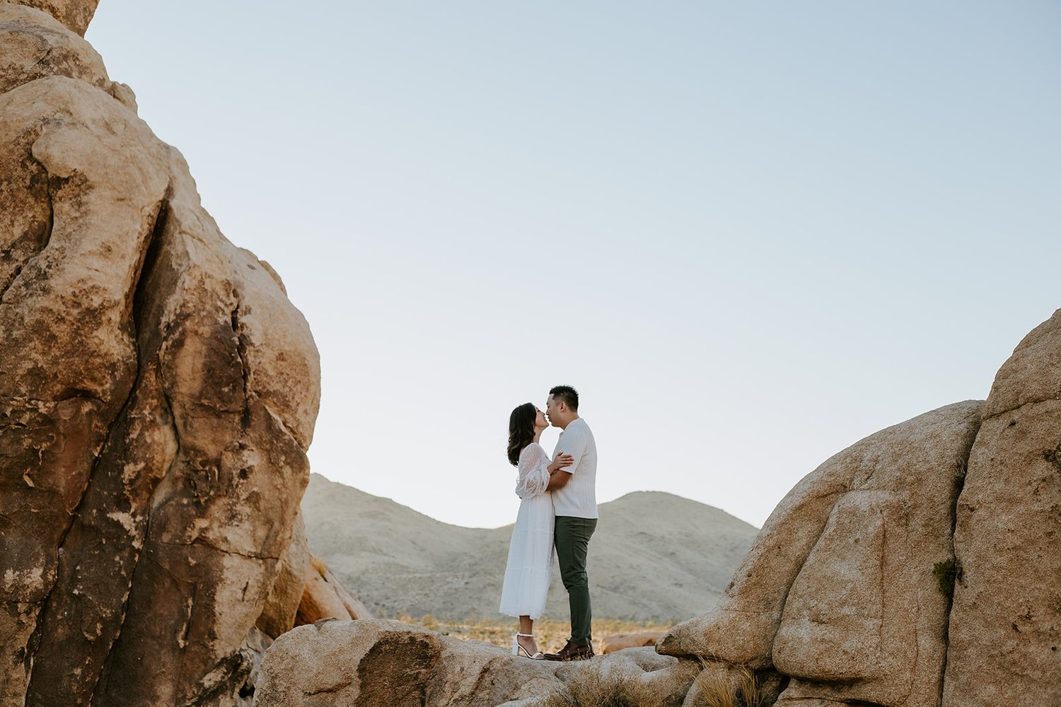 Kiss between giant boulders